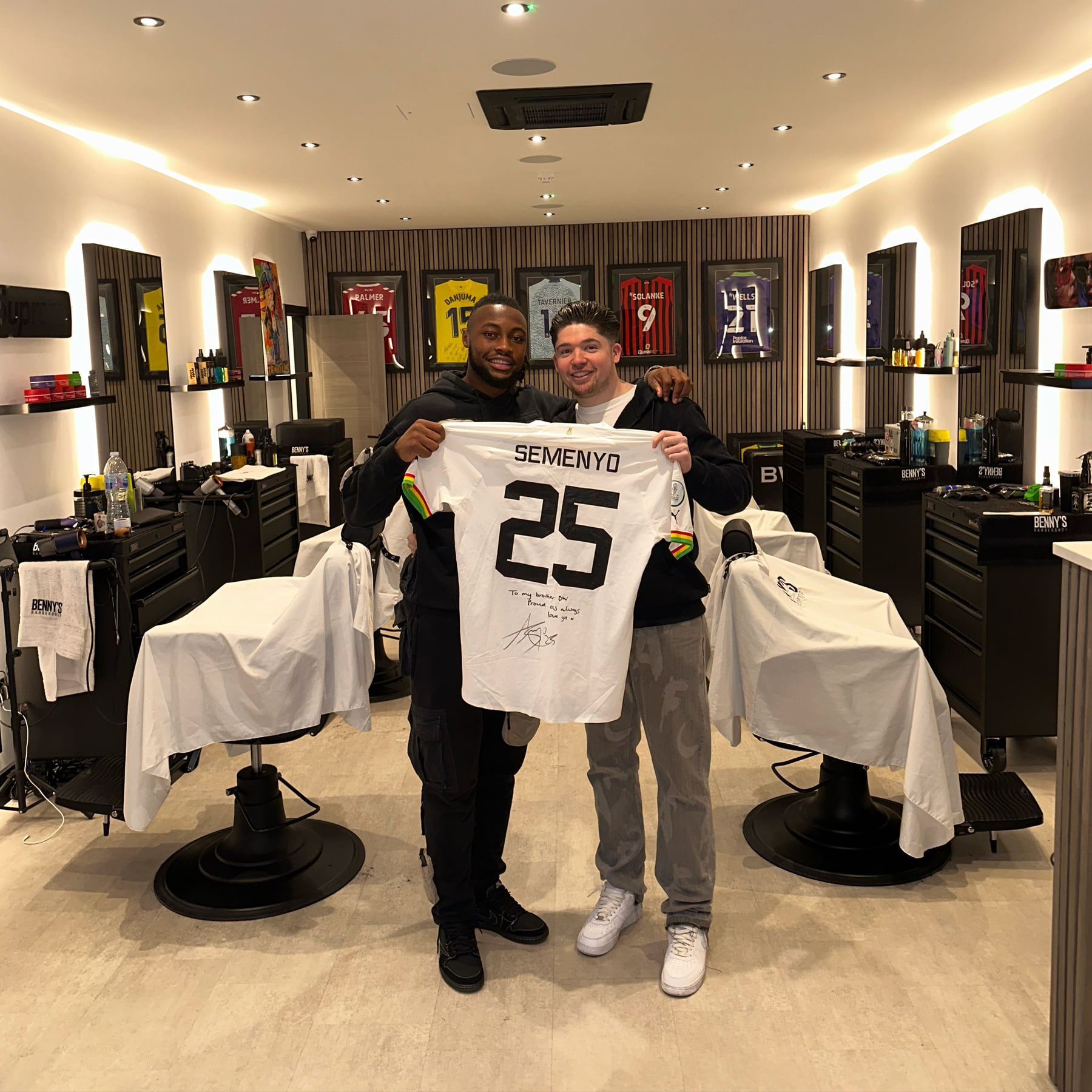 A footballer at Benny's Barbershop