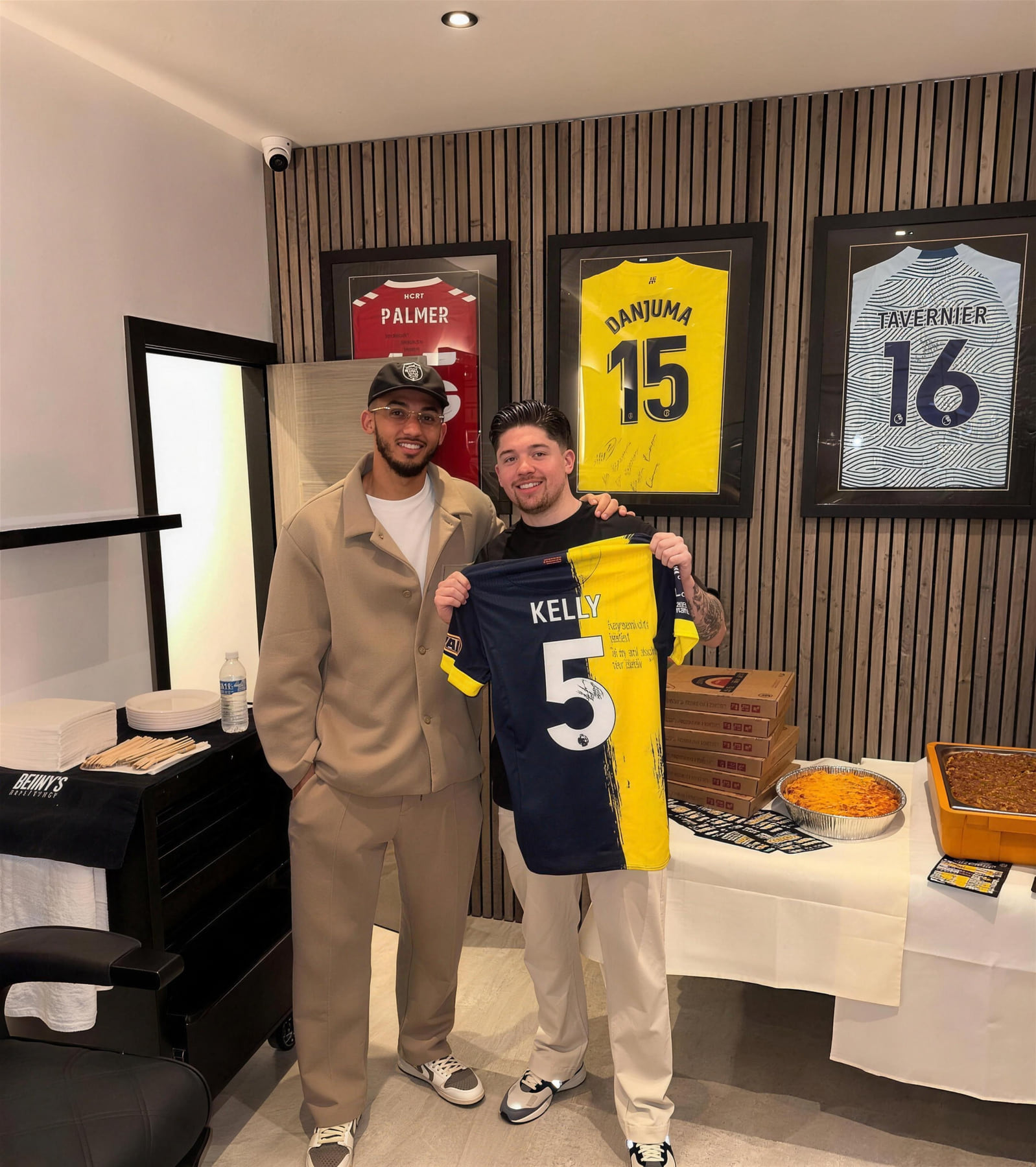 A footballer at Benny's Barbershop